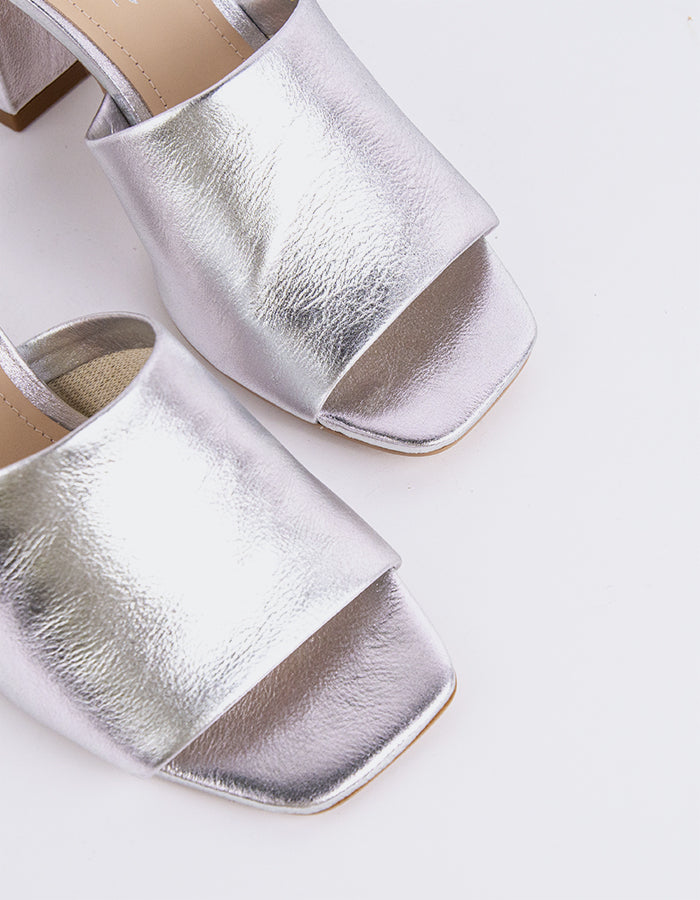 Effortless Block Heel Mule

This block heel mule combines modern sophistication with everyday comfort. Featuring a sturdy, square block heel for added stability and a sleek open-back design, it offers both style and ease of wear. The minimalistic silhouette makes it perfect for pairing with a variety of outfits, from casual jeans to more polished workwear. With its balance of elegance and practicality, this mule is the perfect addition to any wardrobe.

Detail(s):&nbsp;

Square Toe

2.5”&nbsp; Block Heel

W