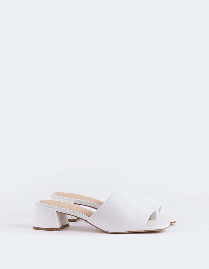 Timeless Low Thick-Heeled Mule
This low thick-heeled mule is the epitome of effortless style and comfort. With its sturdy, wide heel, it offers both stability and support without sacrificing elegance. The open-back design provides ease of wear, making it the perfect go-to shoe for everyday occasions. Whether paired with casual jeans or dressed up with a skirt or dress, this versatile mule offers a chic yet practical solution for all-day wear.

Detail(s):&nbsp;

Square Toe

1.75”&nbsp; Block Heel

We recomme