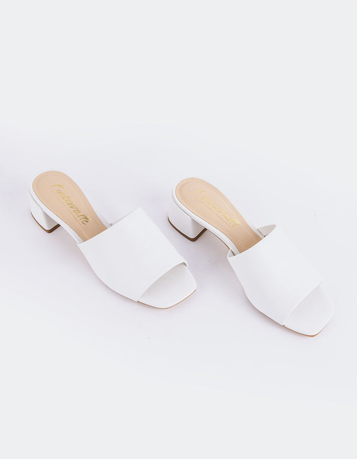 Timeless Low Thick-Heeled Mule
This low thick-heeled mule is the epitome of effortless style and comfort. With its sturdy, wide heel, it offers both stability and support without sacrificing elegance. The open-back design provides ease of wear, making it the perfect go-to shoe for everyday occasions. Whether paired with casual jeans or dressed up with a skirt or dress, this versatile mule offers a chic yet practical solution for all-day wear.

Detail(s):&nbsp;

Square Toe

1.75”&nbsp; Block Heel

We recomme